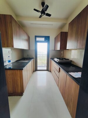 Kitchen in 1 BHK Apartment at Mahavir Kalpavruksha, Ghodbunder Road – for Rent