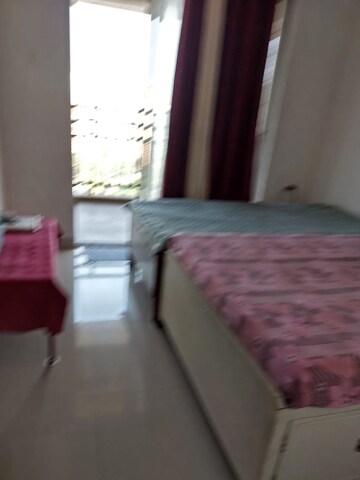 Bedroom in 2 BHK Apartment at Majestique Landmark Miami, Dhayari – for Rent