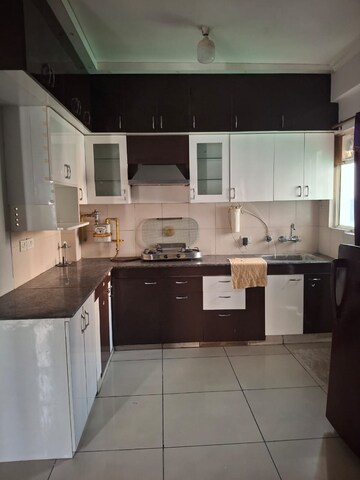 Kitchen in 2 BHK Apartment at Ajnara Homes, Sector 16b Greater Noida – for Sale