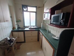 Kitchen in 2 BHK Apartment at Surya CHS Vashi, Vashi Sector 3 – for Sale