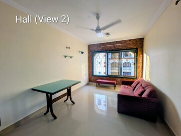 Living Room in 2 BHK Apartment at Ekta Vivek Enclave, Dahisar West – for Sale