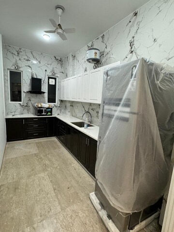 Kitchen in 2.5 BHK Apartment at Spazedge, Sector 47 – for Sale