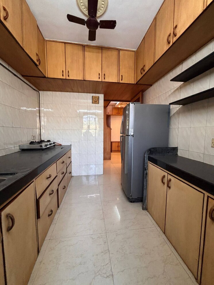 Kitchen, satellite-garden 2 Bedroom 950 Sq.Ft. Apartment In Goregaon East Mumbai 9495273