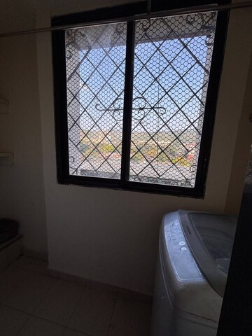 Room in 2 BHK Apartment at Satellite Garden, Goregaon East – for Rent