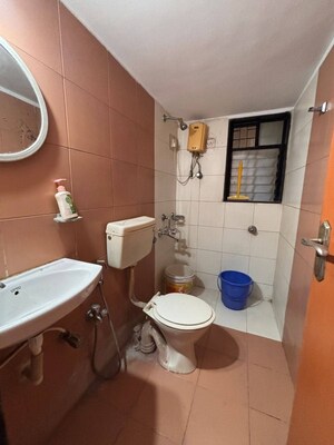 Master Bedroom in 2 BHK Apartment at Satellite Garden, Goregaon East – for Rent