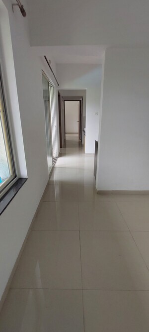 Living Room in 2 BHK Apartment at Majestique Landmark Miami, Dhayari – for Rent