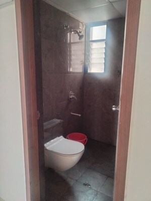 Bathroom in 2 BHK Apartment at Mantra Monarch, Balewadi – for Rent