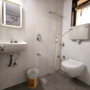 Bathroom in 2 BHK Apartment at Prathamesh CHS, Ic Colony – for Rent