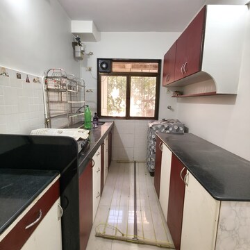 Kitchen in 2 BHK Apartment at Prathamesh CHS, Ic Colony – for Rent