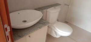 Bathroom in 2 BHK Apartment at Bhartiya Nikoo Homes Phase 2, Thanisandra Main Road – for Rent
