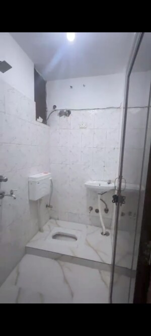 Bathroom in 2 BHK Builder Floor at Chattarpur – for Rent