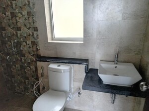 Bathroom in 2.5 BHK Apartment at Mahagun Mirabella, Sector 79 – for Rent
