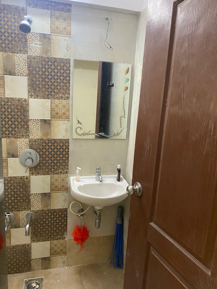 Bathroom, cosmos-orchid 2 Bedroom 730 Sq.Ft. Apartment In Ghodbunder Road Thane 9495884