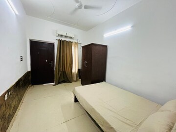 Bedroom in 1 RK Independent House at The Sangam CHS, Sector 21d – for Rent
