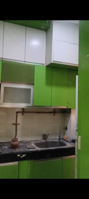 Kitchen in 2 BHK Apartment at Mahagun Mywoods, Sector 16c Greater Noida – for Rent