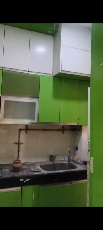 Kitchen in 2 BHK Apartment at Mahagun Mywoods, Sector 16c Greater Noida – for Rent
