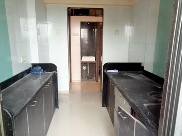 Kitchen in 2 BHK Apartment at Ostwal Orchid, Mira Road East – for Sale