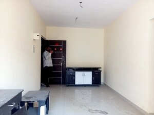 Living Room in 2 BHK Apartment at Ostwal Orchid, Mira Road East – for Sale