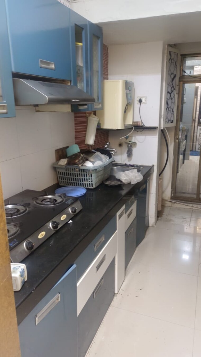 Kitchen, solitaire-3 1 Bedroom 645 Sq.Ft. Apartment In Mira Road Thane 9496372