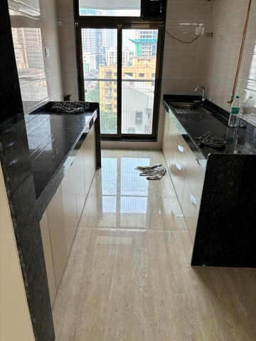 Kitchen in 2 BHK Apartment at Je And Vee Om Trimurti, Malad East – for Rent