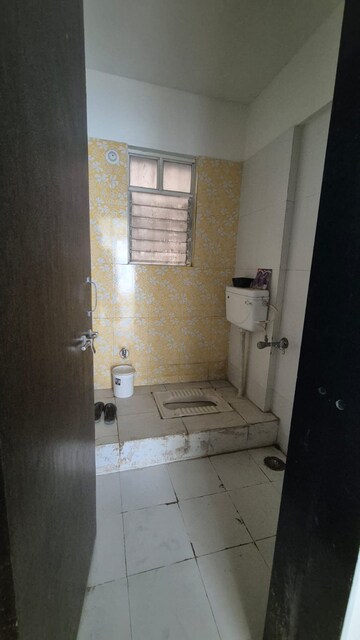 Bathroom in 2 BHK Apartment at B K Pate Golden Petals, Karve Nagar – for Rent