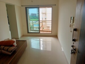 Living Room in 1 BHK Apartment at Paradise Sai Riverdale, Taloja – for Sale
