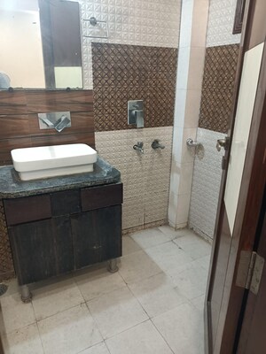 Bathroom in 3 BHK Builder Floor at Surajmal Vihar – for Rent