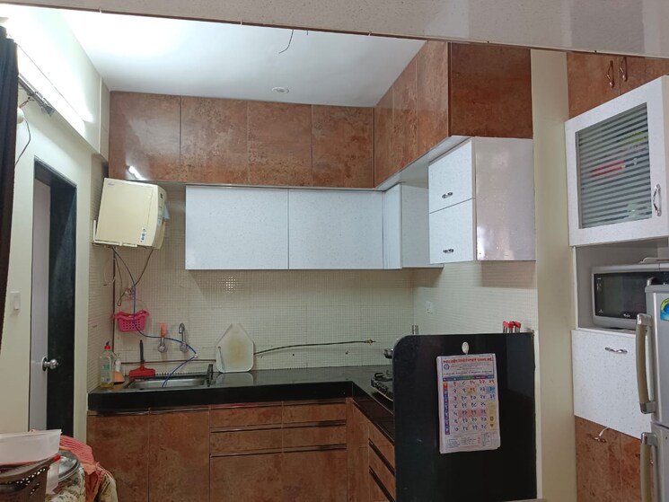 Kitchen, the-royal-miraj 2 Bedroom 950 Sq.Ft. Apartment In Wakad Pune 9497578