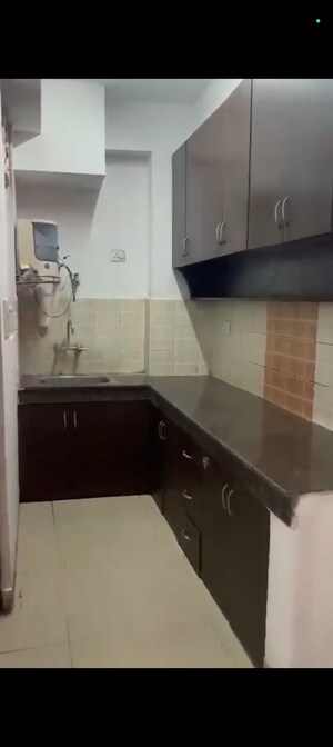 Kitchen in 2 BHK Apartment at Ajnara Integrity, Raj Nagar Extension – for Sale