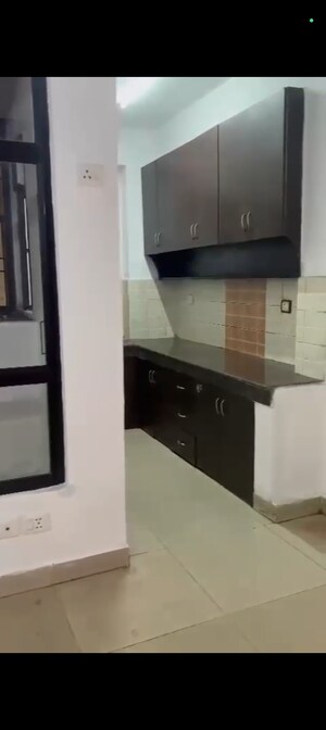 Kitchen in 2 BHK Apartment at Ajnara Integrity, Raj Nagar Extension – for Sale