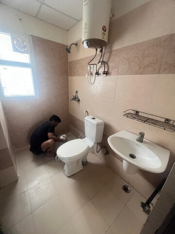 Bathroom in 3 BHK Apartment at Amrapali Silicon City, Sector 76 – for Rent