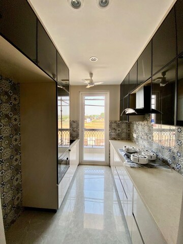 Kitchen in 3.5 BHK Apartment at Godrej Meridien, Sector 106 – for Sale