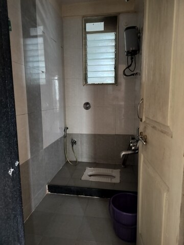 Bathroom in 2 BHK Apartment at Giriraaj Tower, Kopar Khairane – for Rent