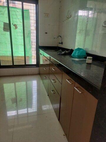 Kitchen in 2 BHK Apartment at Giriraaj Tower, Kopar Khairane – for Rent
