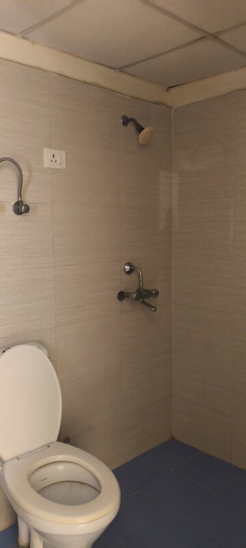 Bathroom in 3.5 BHK Apartment at Aims Golf City, Sector 75 – for Rent