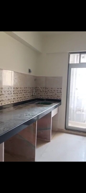 Kitchen in 3 BHK Apartment at Mahavir Square, Manpada – for Sale