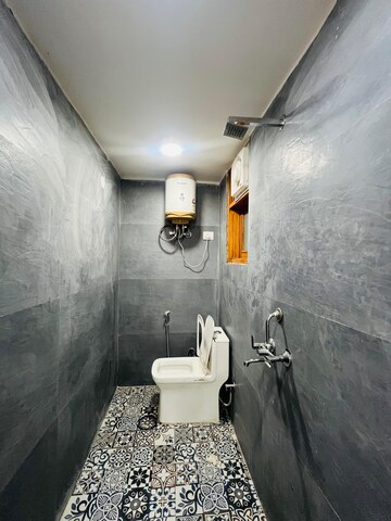 Bathroom in 1 BHK Builder Floor at Freedom Fighters Enclave – for Rent