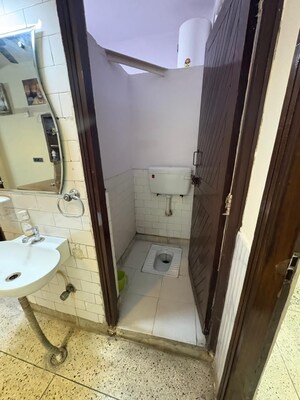 Bathroom in 2 BHK Builder Floor at Kalkaji – for Rent