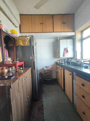 Kitchen in 2 BHK Apartment at Suraj Park, Kalwa – for Sale