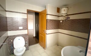 Bathroom in 3 BHK Apartment at Essentia Homes, Vip Road – for Rent
