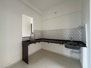 Kitchen in 2 BHK Apartment at Godrej Boulevard, Manjari – for Rent