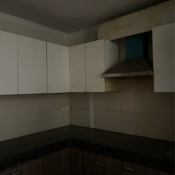 Kitchen in 2 BHK Apartment at Maya Garden City, Nagla Road – for Rent
