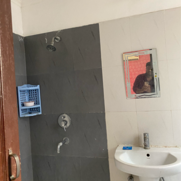 Bathroom in 2 BHK Apartment at Maya Garden City, Nagla Road – for Rent