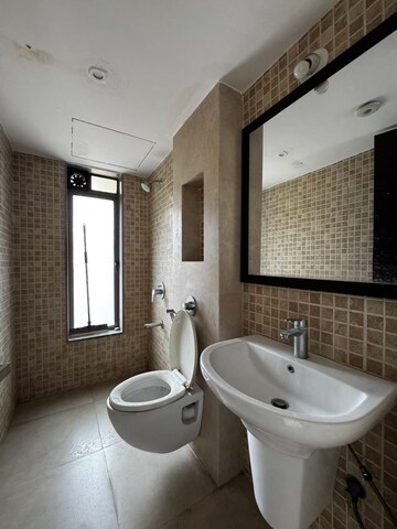 Bathroom in 2 BHK Apartment at Virani Sukoon Heights, Kausa – for Sale