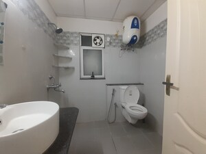 Bathroom in 3 BHK Apartment at Sushma Valencia, International Airport Road – for Rent