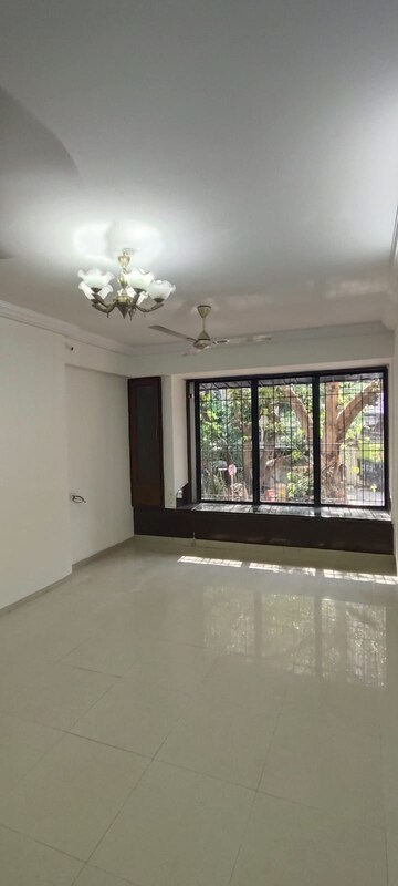 Living Room in 3 BHK Apartment at Ajmera Golden Rays, Andheri West – for Sale