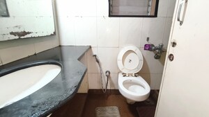 Bathroom in 1 BHK Apartment at Siddhanchal CHS, Pawar Nagar – for Rent