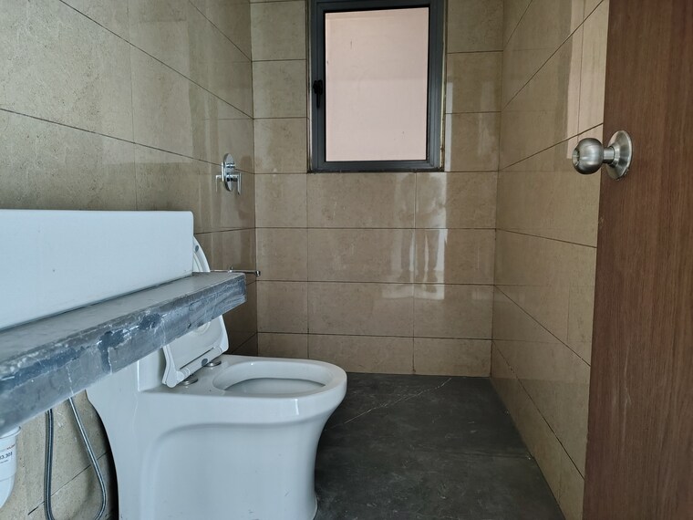 Bathroom, kalpataru-immensa-b 2 Bedroom 632 Sq.Ft. Apartment In Kolshet Road Thane 9499303
