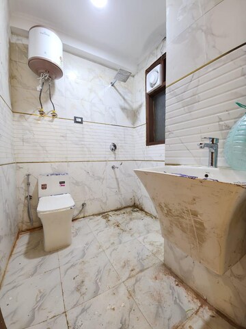 Bathroom in 2 BHK Builder Floor at Chattarpur – for Rent