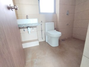 Bathroom in 1 BHK Apartment at Kalpataru Immensa, Kolshet Road – for Rent